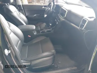2021 Kia Sportage EX z VIN KNDPNCAC5M7886551, wystawiony jako IAAI lot #42645206 z przebiegiem 49 312 mil mil oraz . Historia ofert i sprzedaży dostępna na DreamBid. Obrazek 5.