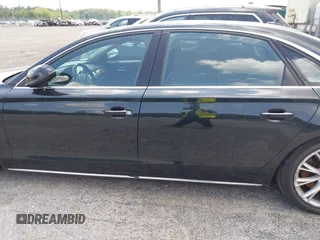 2012 Audi A8 with VIN WAURVAFD2CN002071, listed as a IAAI auction lot 42778424 with Not provided miles and . Bid and sale history available at DreamBid. Image 13.