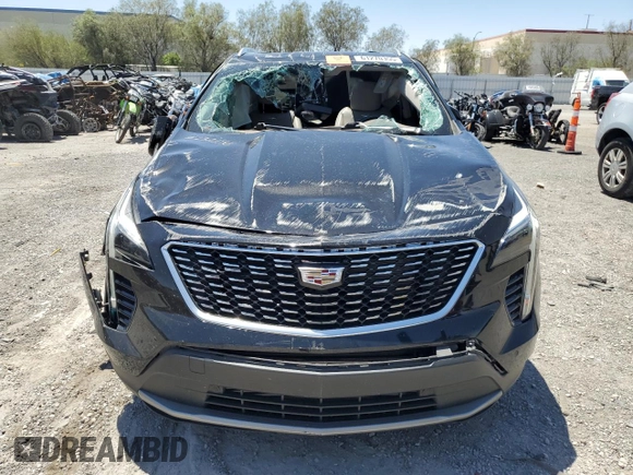 2021 Cadillac XT4 FWD Premium Luxury с VIN 1GYFZCR4XMF004996, выставлен на аукционе Copart как лот 61270355 с пробегом Не указан миль и Списание • Salvage title. История ставок и продаж доступна на DreamBid. Изображение 5.