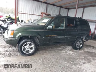 1997 Jeep Grand Cherokee Limited with VIN 1J4GZ78Y5VC723429, listed as a IAAI auction lot 42012836 with 231,126 mi miles. Bid and sale history available at carsss.com. Image 14.