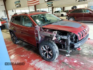 2016 Jeep Cherokee Trailhawk with VIN 1C4PJMBS2GW298186, listed as a Copart auction lot 62999945 with 153,064 mi miles and Salvage title. Bid and sale history available at DreamBid. Image 4.