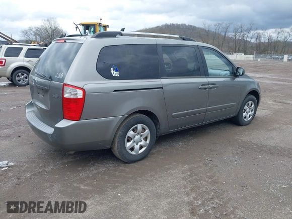 2010 Kia Sedona LX with VIN KNDMG4C30A6329449, listed as a IAAI auction lot 41946489 with 202,881 mi miles. Bid and sale history available at carsss.com. Image 4.