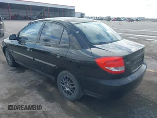 2005 Kia Rio with VIN KNADC125X56377797, listed as a IAAI auction lot 41685739 with 103,390 mi miles. Bid and sale history available at carsss.com. Image 3.