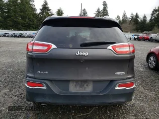 2014 Jeep Cherokee Altitude with VIN 1C4PJMCB1EW241229, listed as a Copart auction lot 84825234 with 179,361 mi miles and Salvage Title. Bid and sale history available at carsss.com. Image 6.