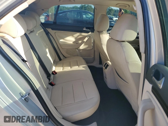 2010 Volkswagen Jetta SE with VIN 3VWRX7AJ1AM048637, listed as a Copart auction lot 57045965 with 158,297 mi miles and Salvage title. Bid and sale history available at DreamBid. Image 10.