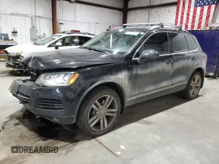 2011 Volkswagen Touareg Exec with VIN WVGFK9BP6BD006430, listed as a Copart auction lot 84288014 with 186,189 mi miles and Salvage Title. Bid and sale history available at DreamBid. Image 1.