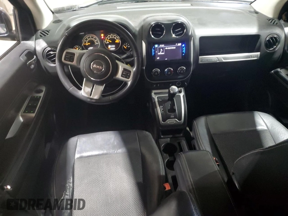 2014 Jeep Compass High Altitude with VIN 1C4NJCEA1ED531388, listed as a Copart auction lot 48048705 with 118,587 mi miles and Salvage Title. Bid and sale history available at carsss.com. Image 8.