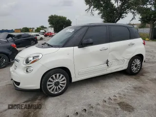 2014 FIAT 500L Easy with VIN ZFBCFABH0EZ000672, listed as a Copart auction lot 62691854 with 60,941 mi miles and Salvage Title. Bid and sale history available at DreamBid. Image 1.