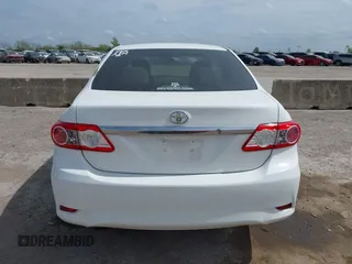 2013 Toyota Corolla L with VIN 5YFBU4EE1DP090957, listed as a IAAI auction lot 41898057 with 127,438 mi miles and . Bid and sale history available at DreamBid. Image 16.