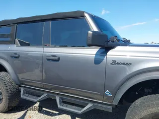 2022 Ford Bronco with VIN 1FMDE5BH9NLB87372, listed as a IAAI auction lot 42178135 with 71,585 mi miles and . Bid and sale history available at DreamBid. Image 13.