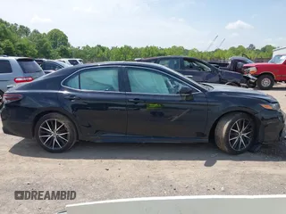 2023 Toyota Camry SE z VIN 4T1T11AK9PU721786, wystawiony jako IAAI lot #42279812 z przebiegiem 30 707 mil mil oraz . Historia ofert i sprzedaży dostępna na DreamBid. Obrazek 13.