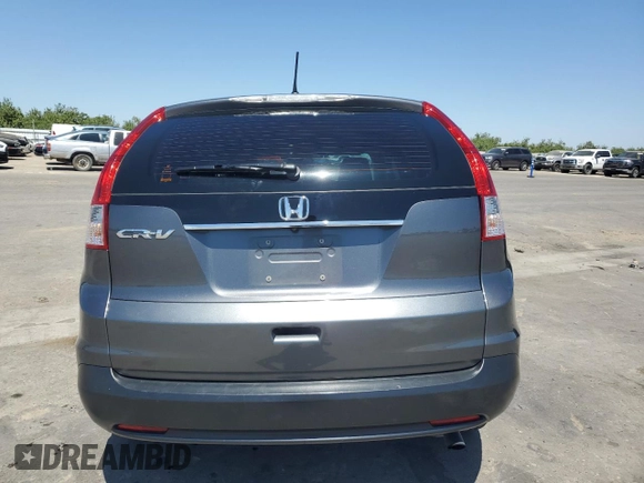 2013 Honda CR-V LX with VIN 2HKRM3H36DH509627, listed as a Copart auction lot 63880025 with 86,310 mi miles and Salvage title. Bid and sale history available at DreamBid. Image 6.