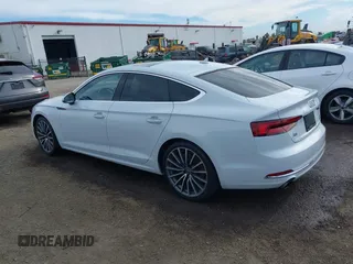 2018 Audi A5 Sportback Premium Plus z VIN WAUBNCF57JA119316, wystawiony jako IAAI lot #38568041 z przebiegiem 101 719 mil mil oraz . Historia ofert i sprzedaży dostępna na DreamBid. Obrazek 3.