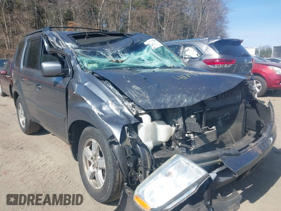 2012 Honda Pilot EX-L with VIN 5FNYF4H75CB045693, listed as a IAAI auction lot 41795689 with 200,686 mi miles and . Bid and sale history available at DreamBid. Image 1.