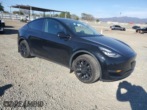 2021 Tesla Model Y Long Range z VIN 5YJYGDEE3MF092495, wystawiony jako Copart lot #50664225 z przebiegiem 72 947 mil mil oraz Szkoda całkowita • Salvage title. Historia ofert i sprzedaży dostępna na DreamBid. Obrazek 4.