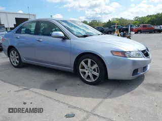 2004 Acura TSX w/Navigation with VIN JH4CL96944C045735, listed as a IAAI auction lot 42042197 with 197,900 mi miles. Bid and sale history available at carsss.com. Image 1.