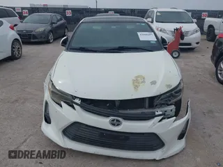 2016 Scion tC with VIN JTKJF5C75GJ016412, listed as a IAAI auction lot 42068497 with 1 mi miles. Bid and sale history available at carsss.com. Image 12.