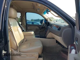 2014 Chevrolet Tahoe LT with VIN 1GNSCBE01ER235571, listed as a IAAI auction lot 42403118 with 238,069 mi miles and . Bid and sale history available at DreamBid. Image 5.