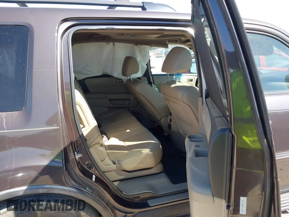 2012 Honda Pilot Touring with VIN 5FNYF4H99CB069996, listed as a IAAI auction lot 41809046 with 140,836 mi miles and . Bid and sale history available at DreamBid. Image 8.