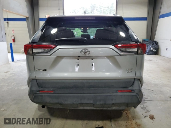 2019 Toyota RAV4 XLE with VIN 2T3P1RFV4KW042785, listed as a Copart auction lot 53110825 with 70,533 mi miles and Salvage Title. Bid and sale history available at DreamBid. Image 6.