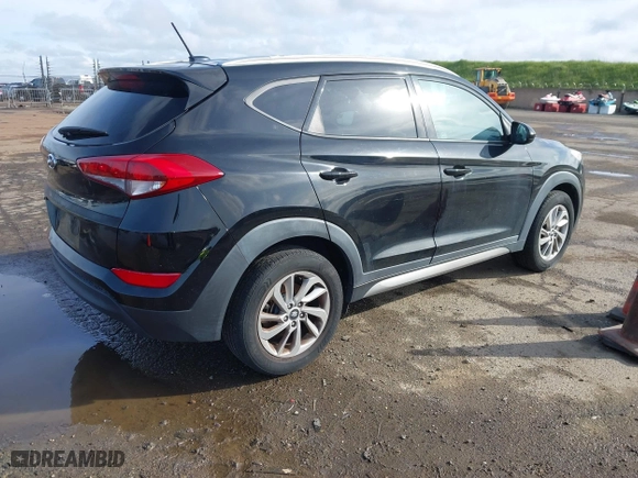 2017 Hyundai Tucson SE Plus with VIN KM8J33A41HU327540, listed as a IAAI auction lot 41820850 with 129,227 mi miles. Bid and sale history available at carsss.com. Image 4.