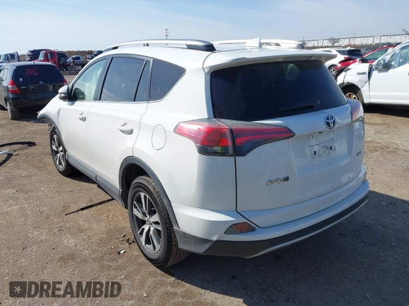 2018 Toyota RAV4 XLE with VIN JTMWFREV7JJ728184, listed as a IAAI auction lot 41377413 with 117,957 mi miles. Bid and sale history available at carsss.com. Image 3.