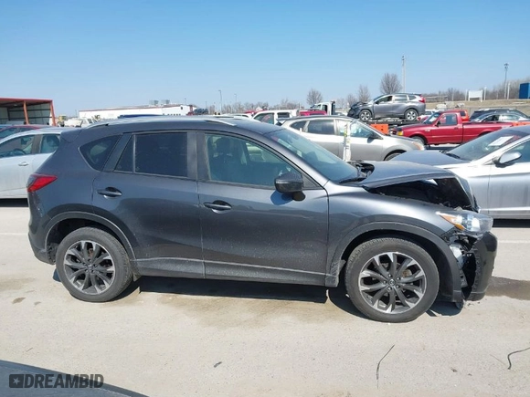 2016 Mazda CX-5 Grand Touring with VIN JM3KE4DY5G0837958, listed as a IAAI auction lot 41713313 with NaN miles. Bid and sale history available at carsss.com. Image 13.