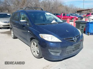 2009 Mazda Mazda5 Sport with VIN JM1CR293590327504, listed as a IAAI auction lot 41629694 with 105,680 mi miles. Bid and sale history available at carsss.com. Image 1.