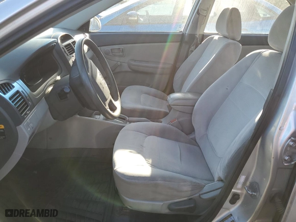 2009 Kia Spectra EX with VIN KNAFE222495620224, listed as a Copart auction lot 78446694 with 120,192 mi miles and Salvage Title. Bid and sale history available at carsss.com. Image 7.
