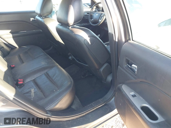 2010 Ford Fusion Hybrid with VIN 3FADP0L39AR125251, listed as a IAAI auction lot 41100606 with 235,612 mi miles. Bid and sale history available at carsss.com. Image 8.