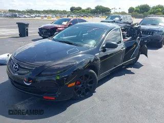 2009 Mazda 6 with VIN 1YVHP80AX95M26374, listed as a IAAI auction lot 42238072 with 158,462 mi miles and . Bid and sale history available at DreamBid. Image 2.