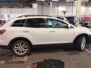 2012 Mazda CX-9 Grand Touring with VIN JM3TB3DV8C0359977, listed as a IAAI auction lot 41142648 with 115,979 mi miles. Bid and sale history available at carsss.com. Image 13.