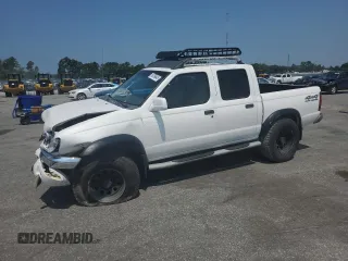 2000 Nissan Frontier XE with VIN 1N6ED27Y7YC413932, listed as a Copart auction lot 58799645 with 225,464 mi miles and Salvage title. Bid and sale history available at DreamBid. Image 1.