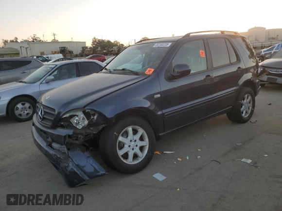 2001 Mercedes-Benz M 320/430/500 z VIN 4JGAB72E91A260677, wystawiony jako Copart lot #89200235 z przebiegiem 180 414 mil mil oraz Szkoda całkowita • Salvage title. Historia ofert i sprzedaży dostępna na DreamBid. Obrazek 1.