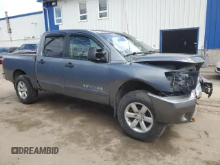 2014 Nissan Titan S with VIN 1N6AA0ECXEN515423, listed as a Copart auction lot 47934505 with 208,900 mi miles and Salvage Title. Bid and sale history available at DreamBid. Image 4.