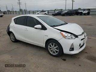 2012 Toyota Prius c One with VIN JTDKDTB34C1026797, listed as a Copart auction lot 52988655 with 155,452 mi miles and Salvage Title. Bid and sale history available at carsss.com. Image 4.