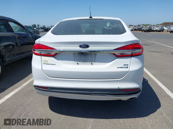 2018 Ford Fusion SE z VIN 3FA6P0LU1JR225930, wystawiony jako IAAI lot #42508239 z przebiegiem 202 272 mil mil oraz . Historia ofert i sprzedaży dostępna na DreamBid. Obrazek 16.