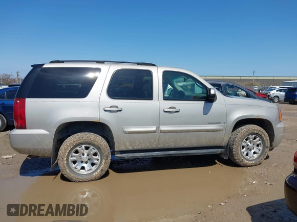 2007 GMC Yukon SLE z VIN 1GKFK13057J197990, wystawiony jako IAAI lot #41963224 z przebiegiem 187 060 mil mil oraz . Historia ofert i sprzedaży dostępna na DreamBid. Obrazek 13.
