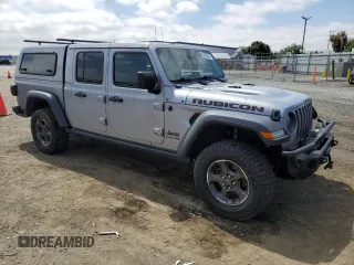 2021 Jeep Gladiator Rubicon with VIN 1C6JJTBG4ML534725, listed as a Copart auction lot 53990494 with 37,478 mi miles and Salvage title. Bid and sale history available at DreamBid. Image 4.