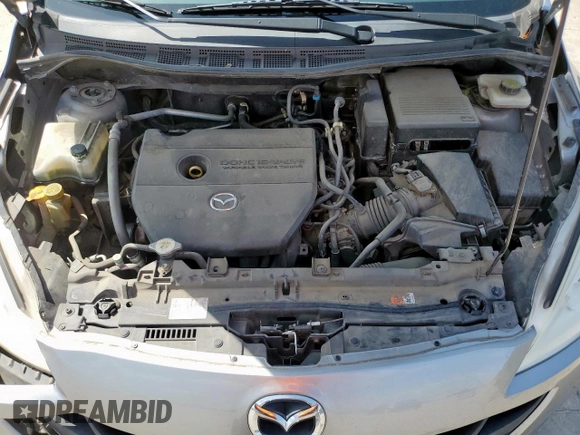 2012 Mazda 5 Sport with VIN JM1CW2BL2C0140909, listed as a Copart auction lot 61840615 with 155,863 mi miles and Salvage title. Bid and sale history available at DreamBid. Image 12.