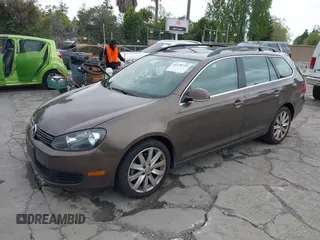 2012 Volkswagen Jetta SportWagen TDI with VIN 3VWPL7AJ1CM602054, listed as a IAAI auction lot 42138739 with 140,202 mi miles. Bid and sale history available at carsss.com. Image 2.