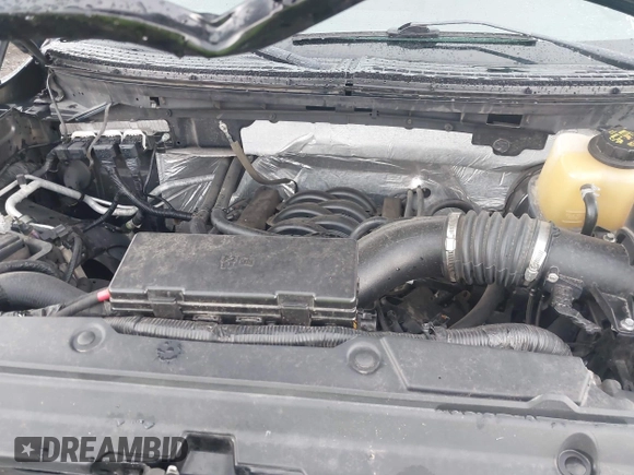 2014 Ford F-150 XL with VIN 1FTMF1CF7EKE73718, listed as a IAAI auction lot 42662490 with 132,762 mi miles and . Bid and sale history available at DreamBid. Image 10.