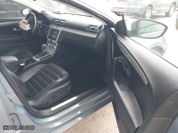 2013 Volkswagen CC Sport with VIN WVWBN7AN8DE560127, listed as a IAAI auction lot 41187465 with 157,182 mi miles. Bid and sale history available at carsss.com. Image 5.