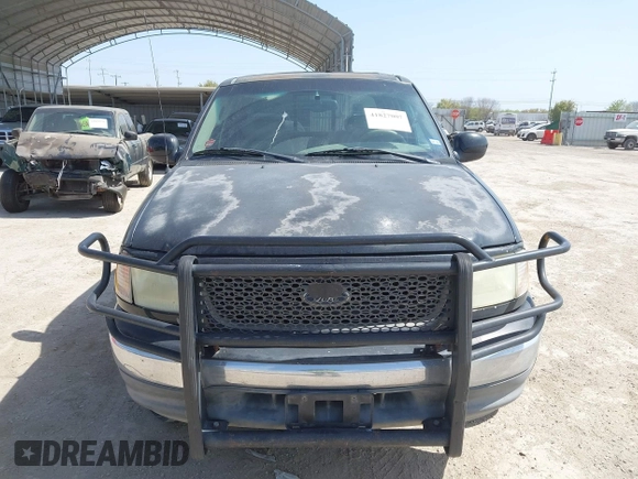 2003 Ford F-150 XLT with VIN 1FTRW07L53KC01651, listed as a IAAI auction lot 41827007 with 233,842 mi miles and . Bid and sale history available at DreamBid. Image 12.