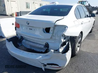 2014 BMW 3 Series 328i with VIN WBA3A5C52EJ463819, listed as a IAAI auction lot 41669717 with 111,112 mi miles. Bid and sale history available at carsss.com. Image 6.