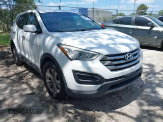 2016 Hyundai Santa Fe z VIN 5XYZT3LB4GG361457, wystawiony jako IAAI lot #42043629 z przebiegiem 149 727 mil mil oraz . Historia ofert i sprzedaży dostępna na DreamBid. Obrazek 1.