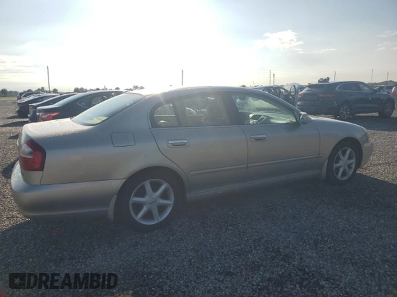 2003 Infiniti Q45 z VIN JNKBF01A93M103010, wystawiony jako Copart lot #74080224 z przebiegiem 46 898 mil mil oraz Szkoda całkowita • Salvage title. Historia ofert i sprzedaży dostępna na DreamBid. Obrazek 3.