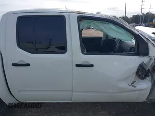 2017 Nissan Frontier SV with VIN 1N6DD0EV2HN765247, listed as a IAAI auction lot 41017764 with 141,942 mi miles and . Bid and sale history available at DreamBid. Image 14.