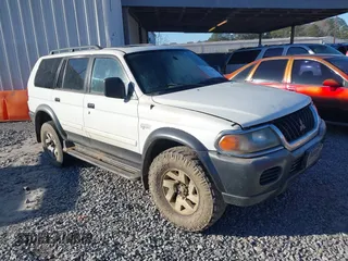 2001 Mitsubishi Montero Sport XLS with VIN JA4LS31H01P015159, listed as a IAAI auction lot 41695828 with 195,233 mi miles. Bid and sale history available at carsss.com. Image 1.