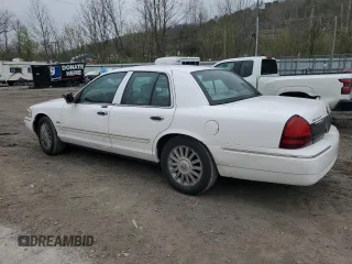 2010 Mercury Grand Marquis LS z VIN 2MEBM7FV2AX606751, wystawiony jako Copart lot #52798295 z przebiegiem 100 616 mil mil oraz Szkody całkowita. Historia ofert i sprzedaży dostępna na DreamBid. Obrazek 2.